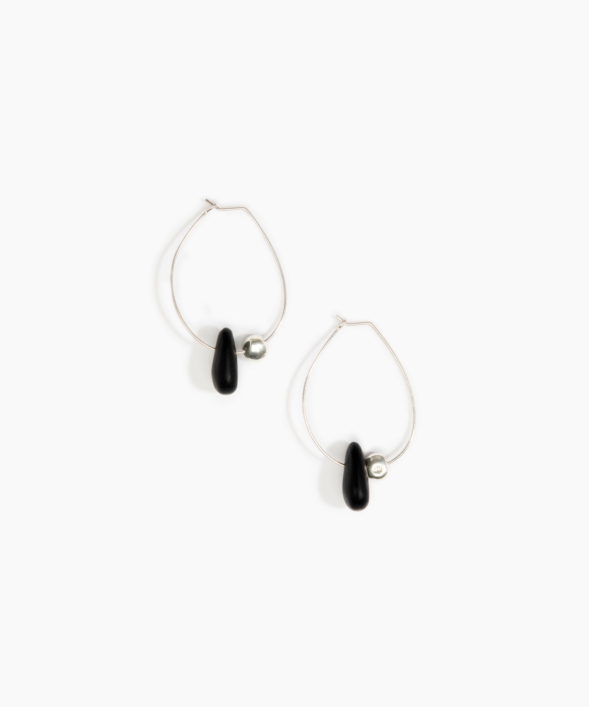 Dinosaur Designs Joie De Vivre Hoop Earrings in Black Colour resin with 925 Sterling Silver Material..