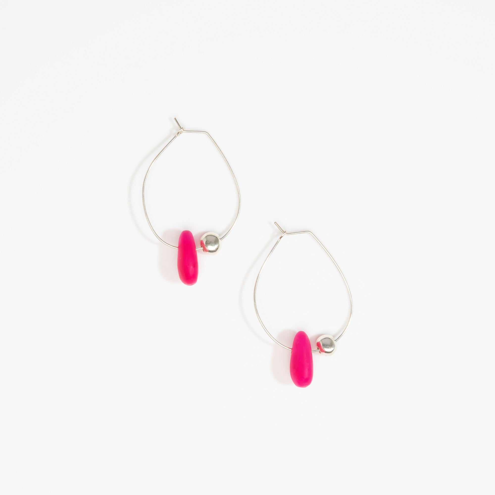 Dinosaur Designs Joie De Vivre Hoop Earrings in Flamingo Colour resin with 925 Sterling Silver Material.