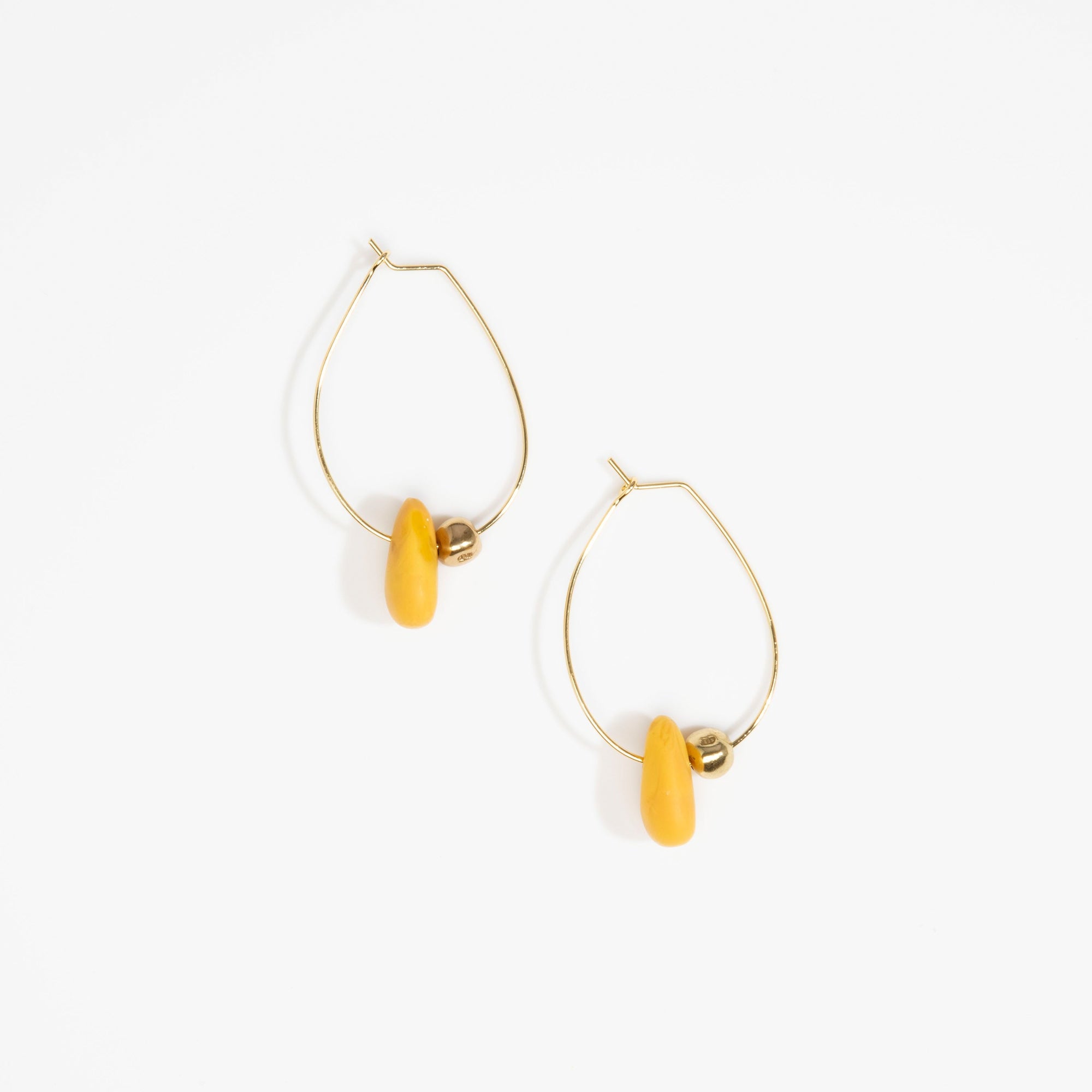 Dinosaur Designs Joie De Vivre Hoop Earrings in Honeycomb Colour resin with Gold-Filled Material.