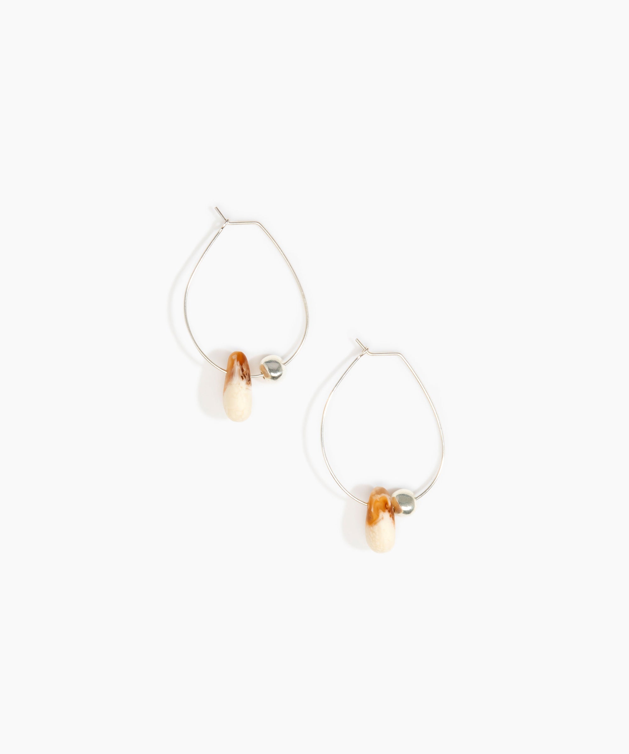Dinosaur Designs Joie De Vivre Hoop Earrings in Light Horn Colour resin with 925 Sterling Silver Material