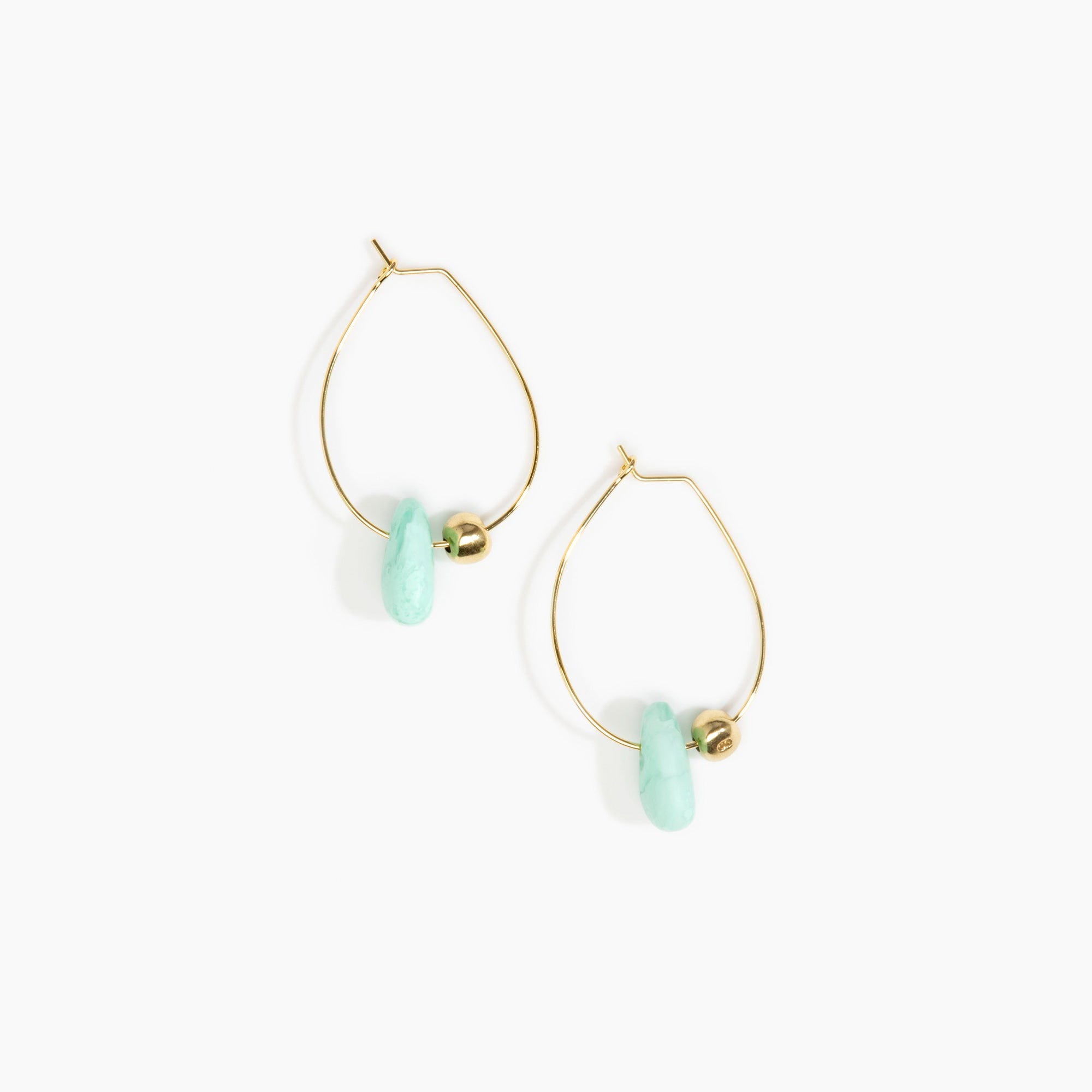 Dinosaur Designs Joie De Vivre Hoop Earrings in Mint Colour resin with Gold-Filled Material.