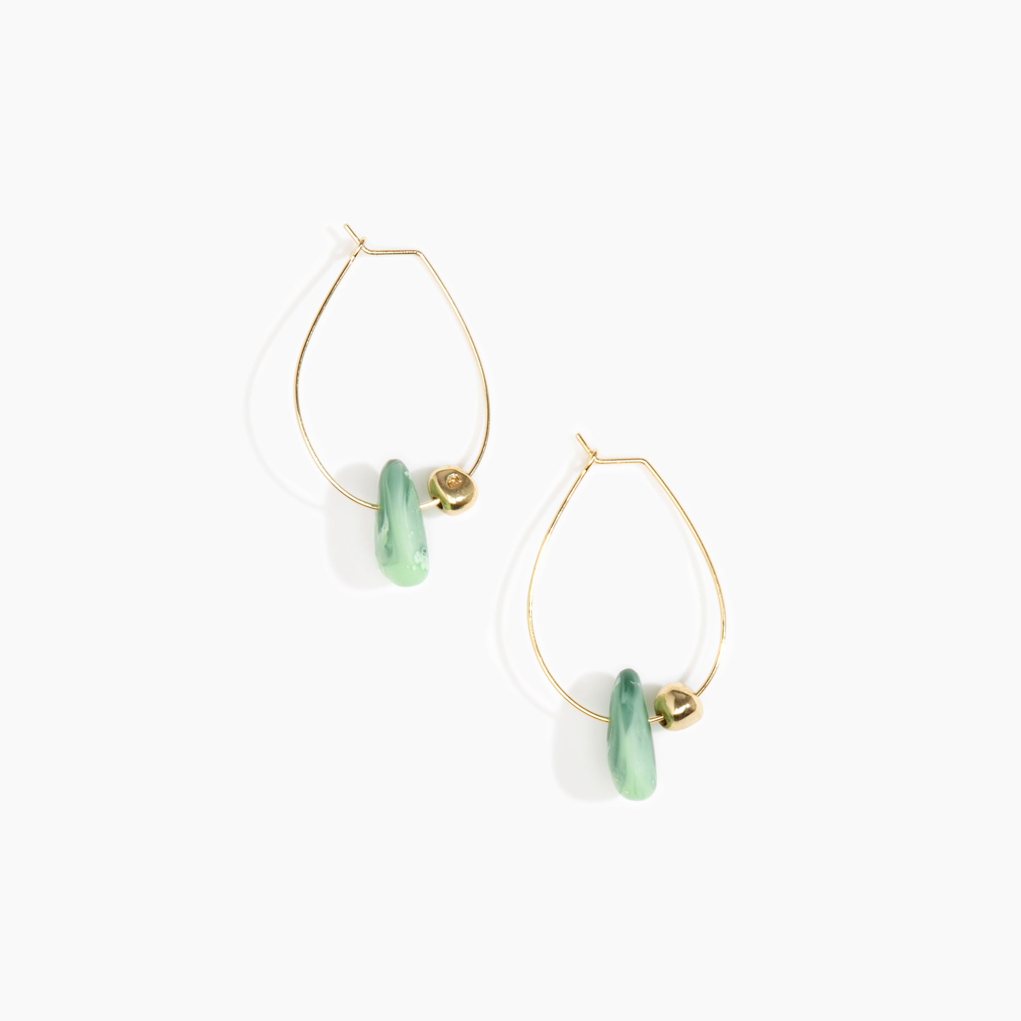 Dinosaur Designs Joie De Vivre Hoop Earrings in Moss Colour resin with Gold-Filled Material.