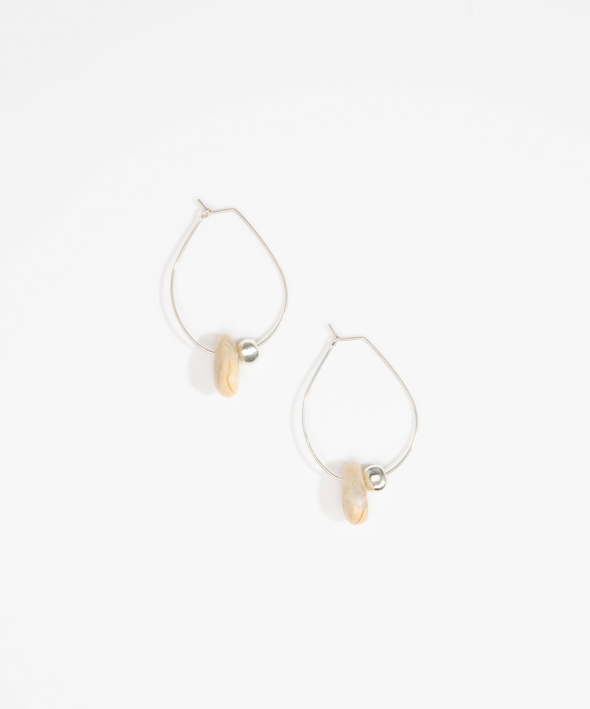 Dinosaur Designs Joie De Vivre Hoop Earrings in Sandy Pearl Colour resin with 925 Sterling Silver Material..