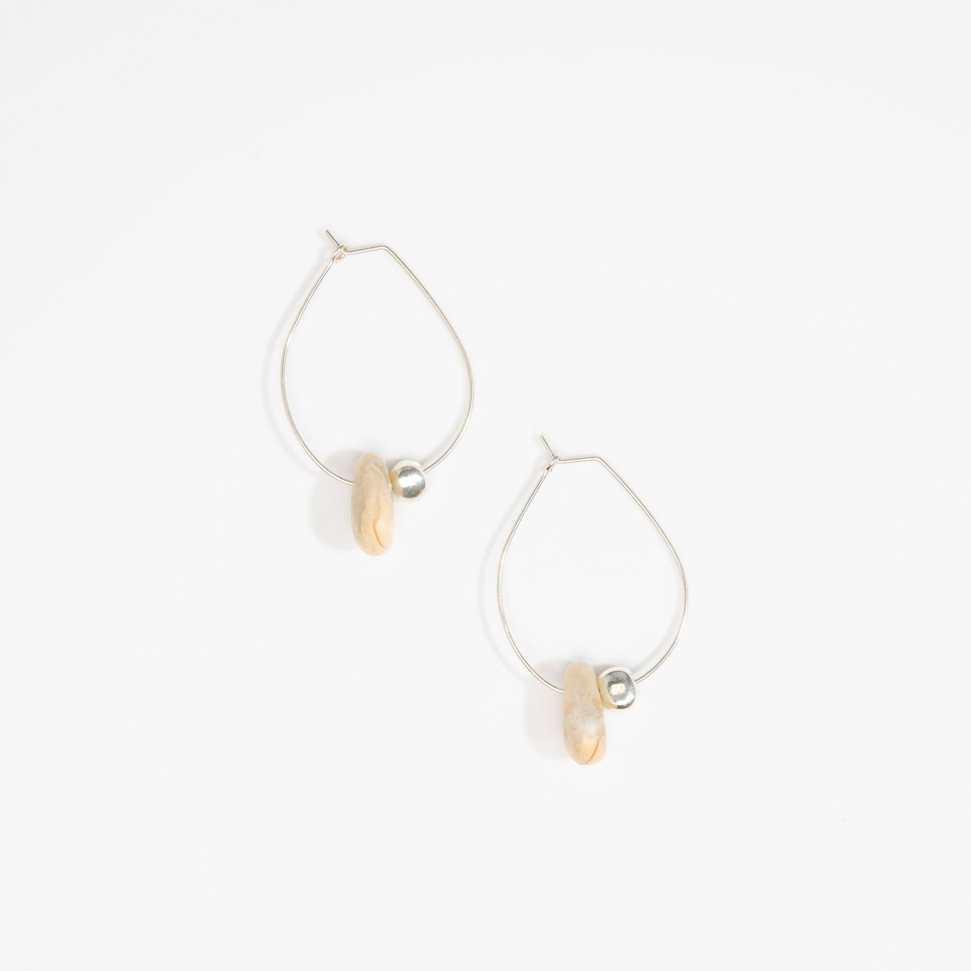 Dinosaur Designs Joie De Vivre Hoop Earrings in Sandy Pearl Colour resin with 925 Sterling Silver Material.