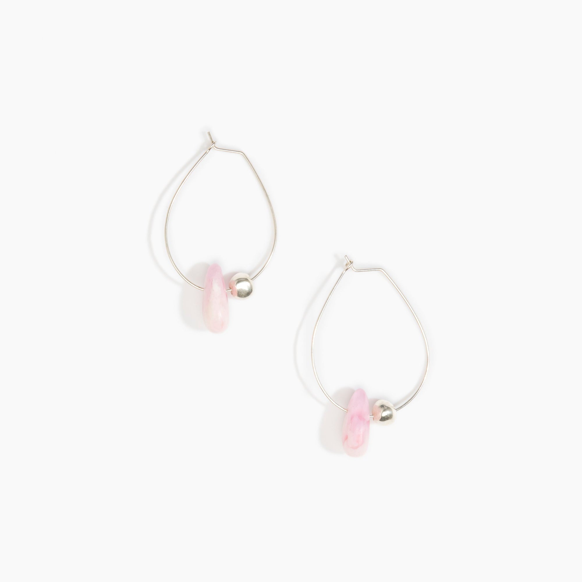 Dinosaur Designs Joie De Vivre Hoop Earrings in Shell Pink Colour resin with 925 Sterling Silver Material.