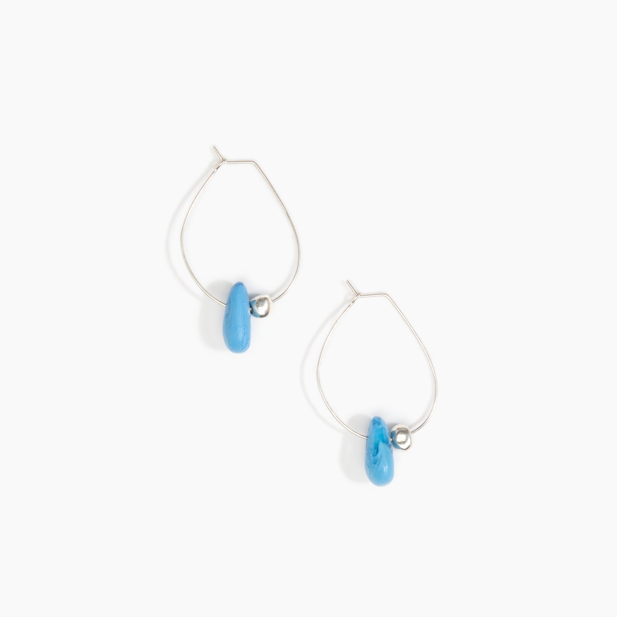 Dinosaur Designs Joie De Vivre Hoop Earrings in Sky Colour resin with 925 Sterling Silver Material.