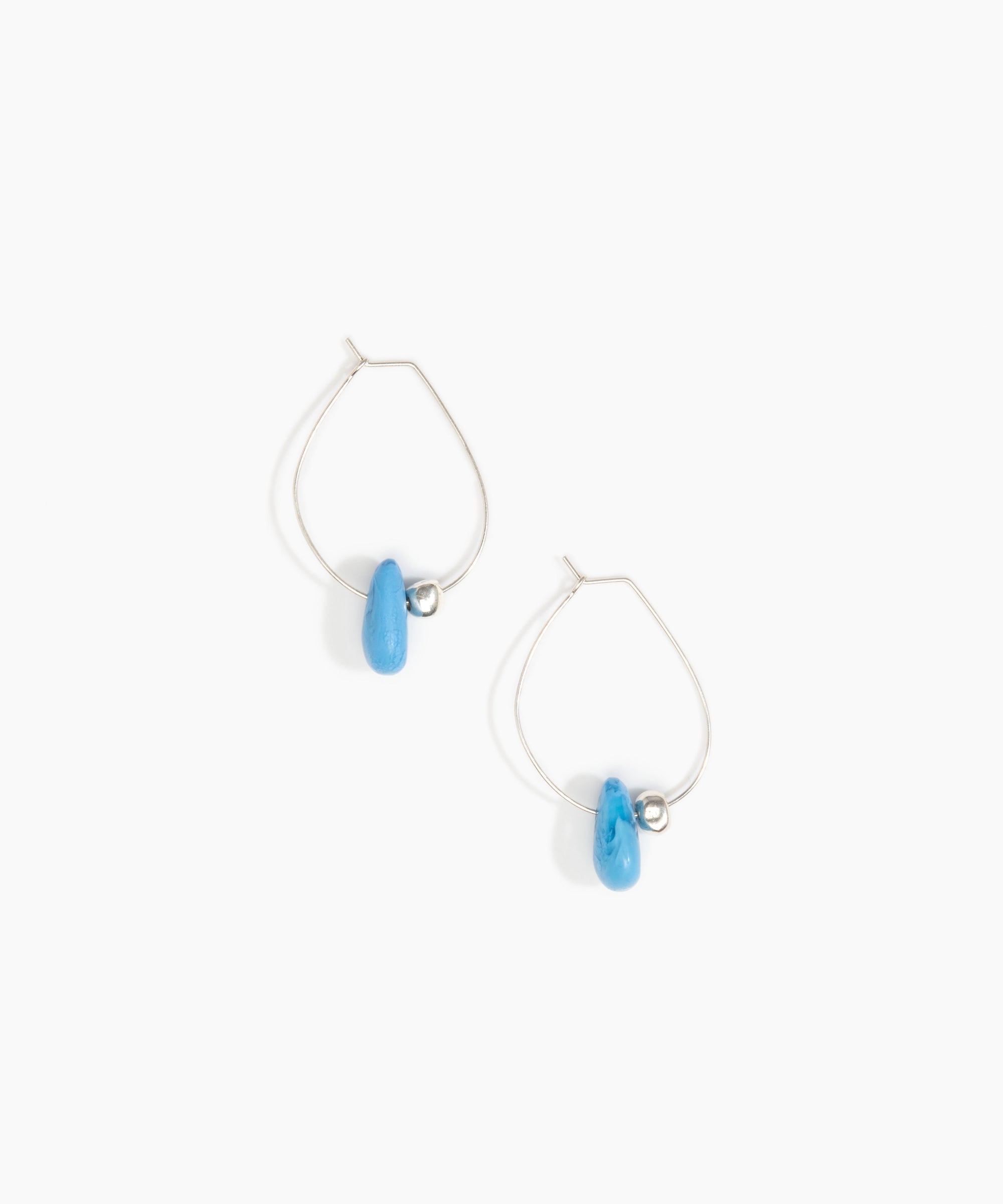Dinosaur Designs Joie De Vivre Hoop Earrings in Sky Colour resin with 925 Sterling Silver Material..