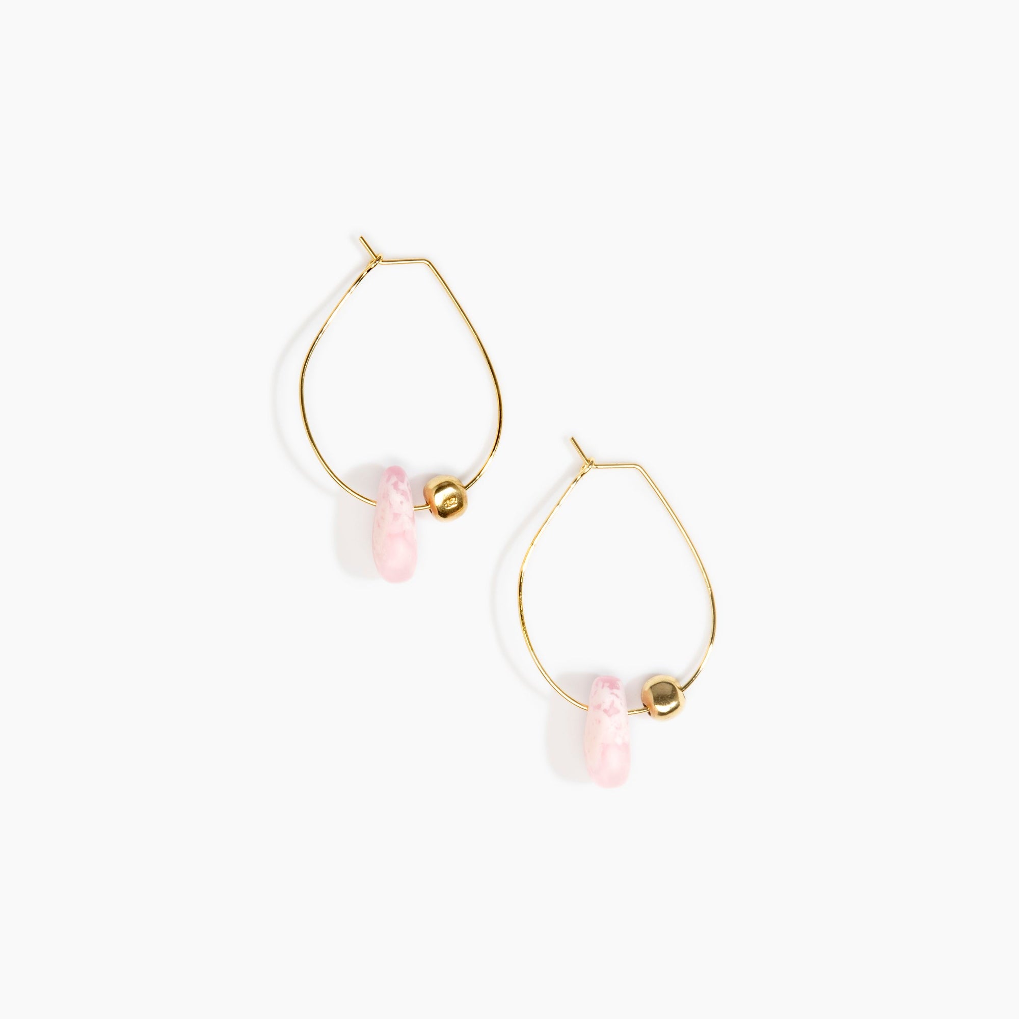 Dinosaur Designs Joie De Vivre Hoop Earrings in Shell Pink Colour resin with Gold-Filled Material.