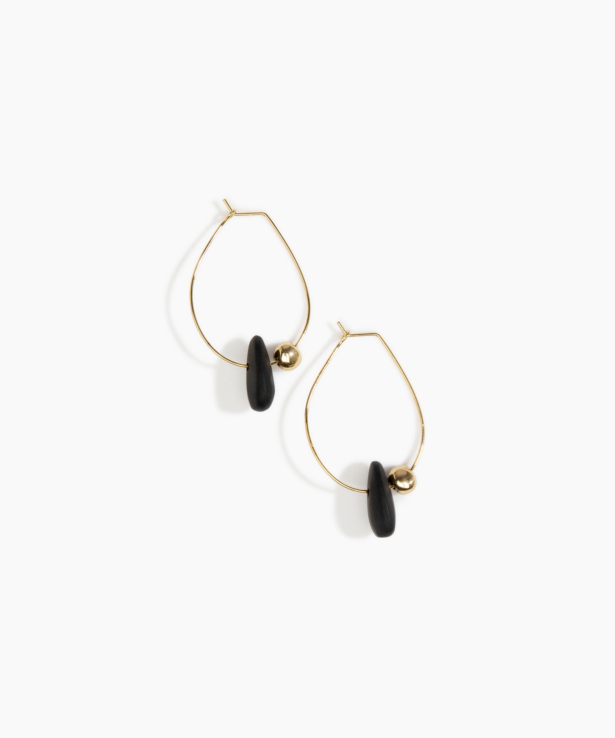 Dinosaur Designs Joie De Vivre Hoop Earrings in Black Colour resin with Gold-Filled Material..