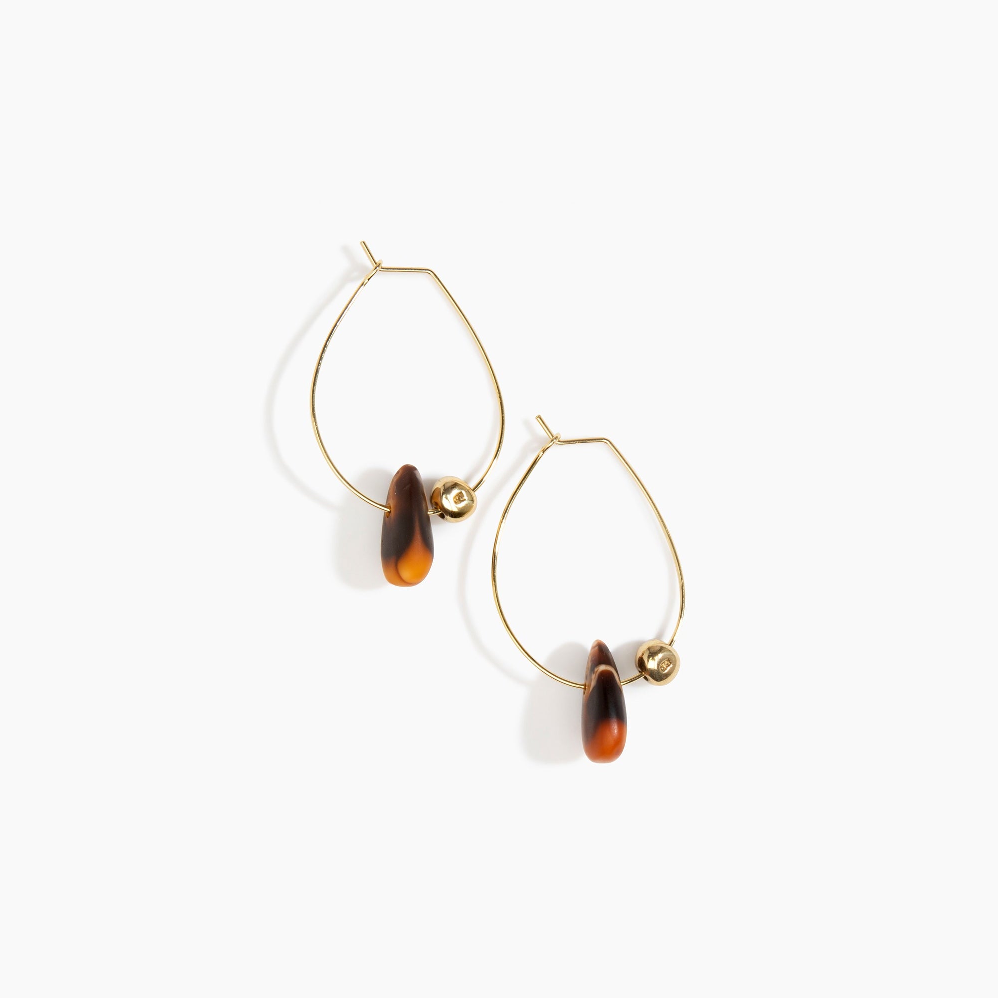 Dinosaur Designs Joie De Vivre Hoop Earrings in Dark Horn Colour resin with Gold-Filled Material.