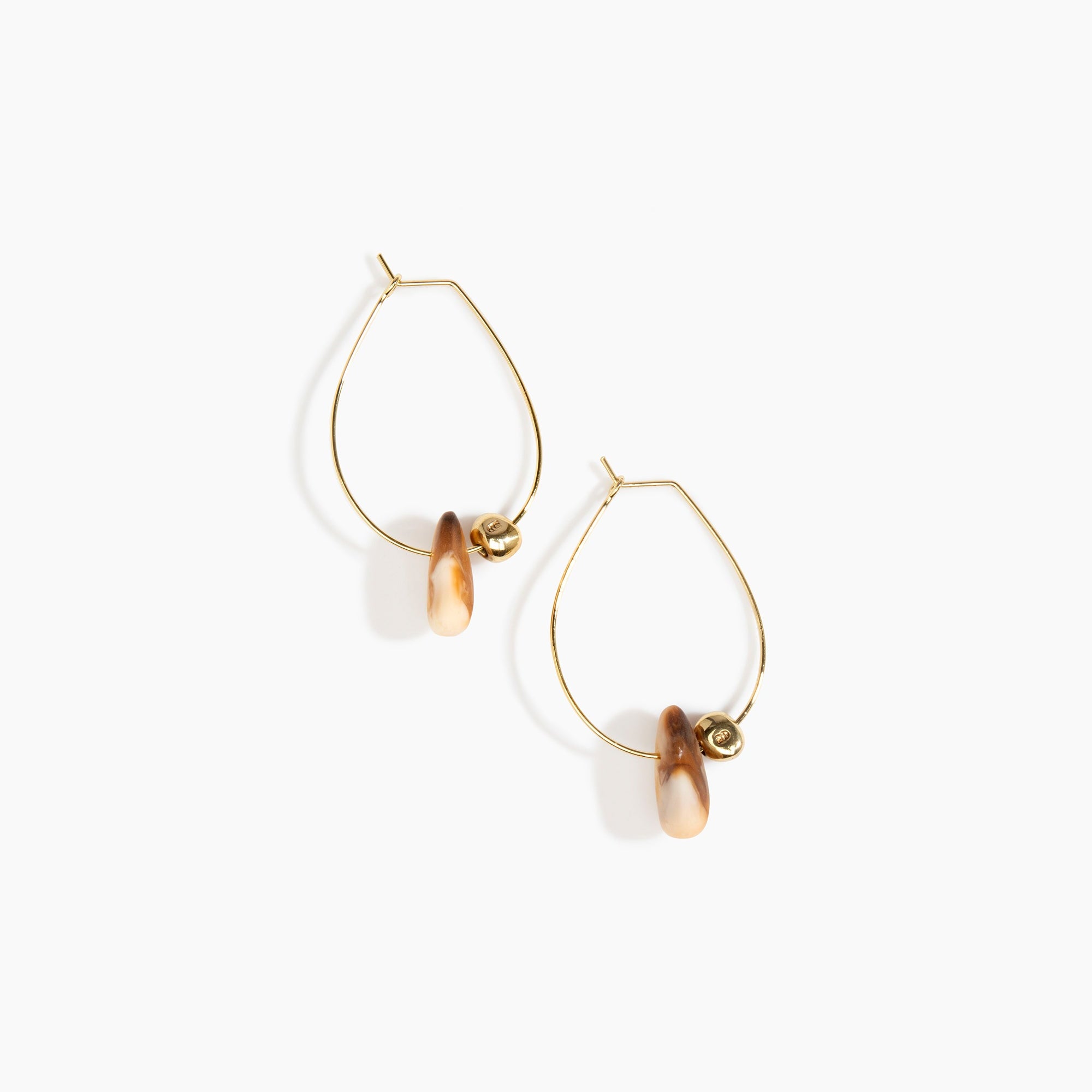 Dinosaur Designs Joie De Vivre Hoop Earrings in Light Horn Colour resin with Gold-Filled Material.