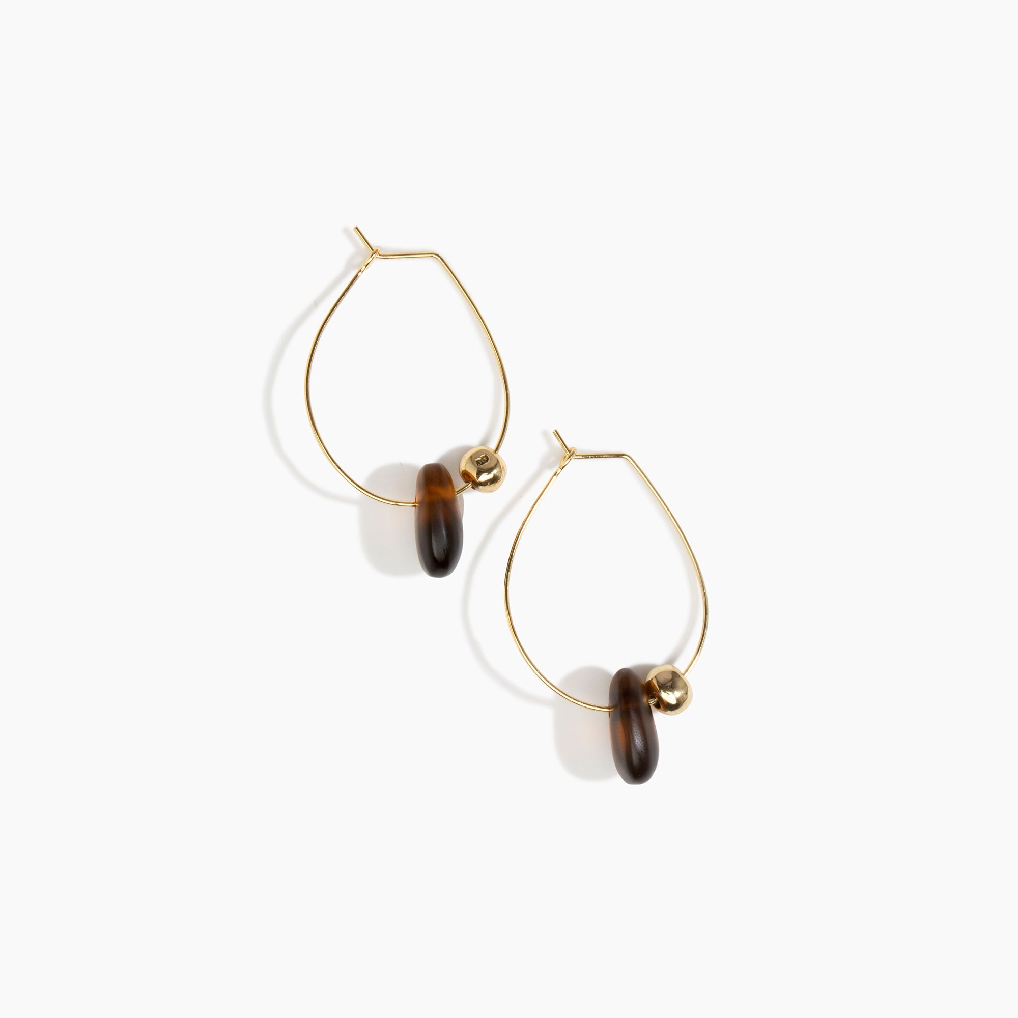 Dinosaur Designs Joie De Vivre Hoop Earrings in Tortoise Colour resin with Gold-Filled Material.