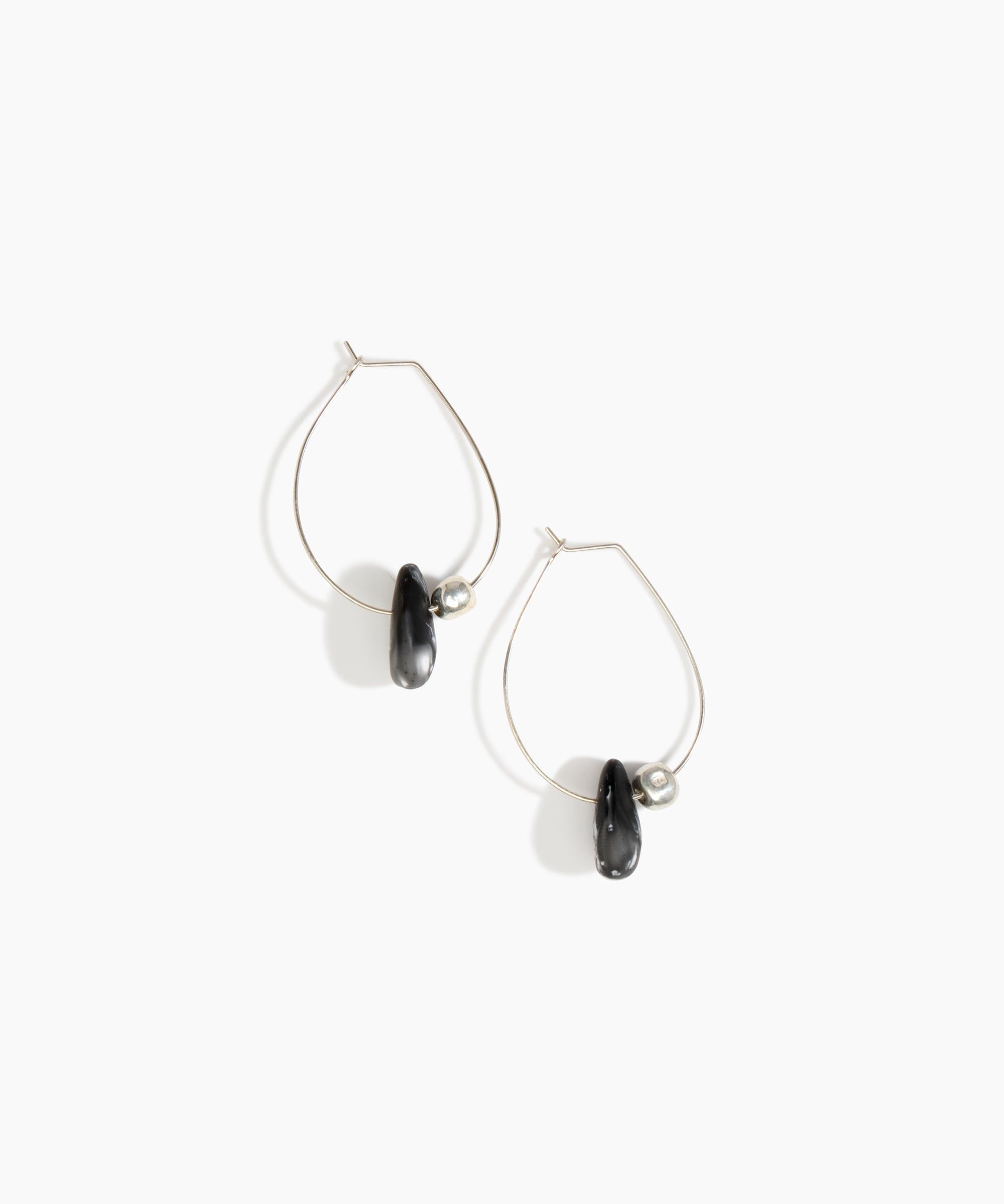 Dinosaur Designs Joie De Vivre Hoop Earrings in Black Marble Colour resin with 925 Sterling Silver Material