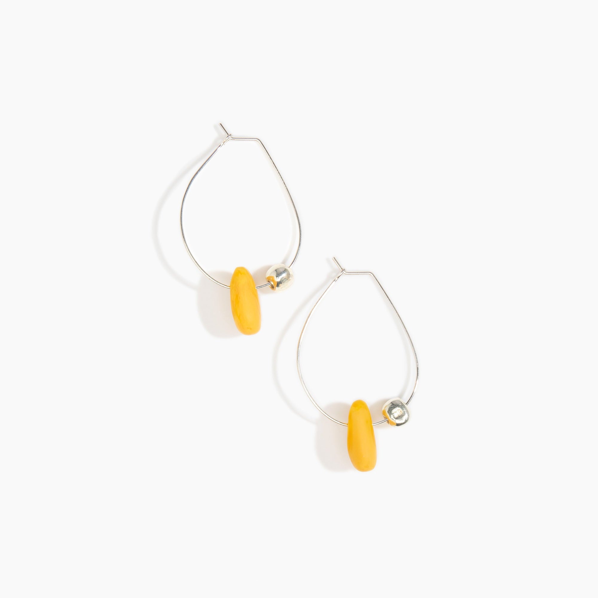 Dinosaur Designs Joie De Vivre Hoop Earrings in Honeycomb Colour resin with 925 Sterling Silver Material.