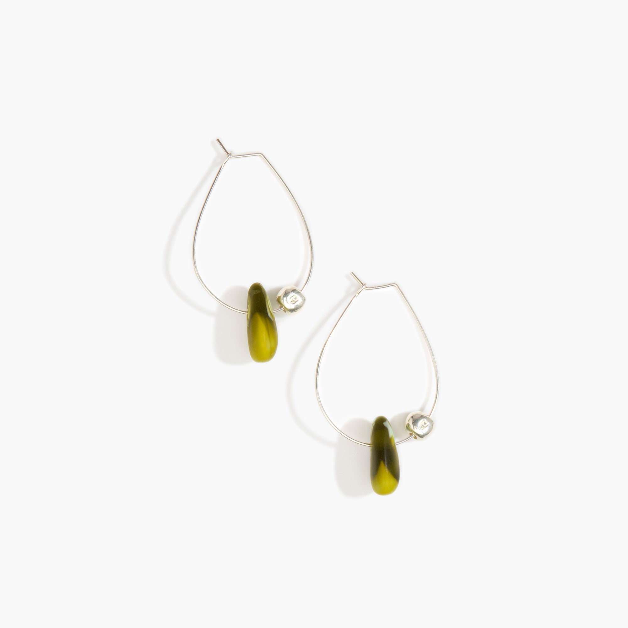 Dinosaur Designs Joie De Vivre Hoop Earrings in Malachite Colour resin with 925 Sterling Silver Material.