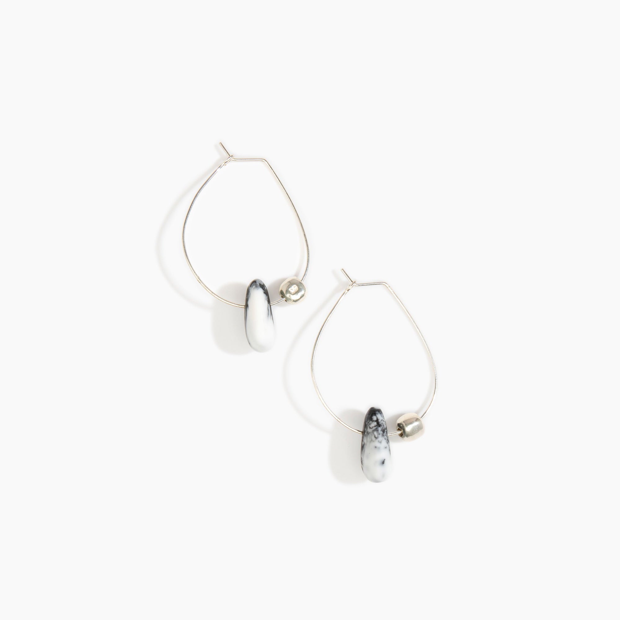 Dinosaur Designs Joie De Vivre Hoop Earrings in White Marble Colour resin with 925 Sterling Silver Material.