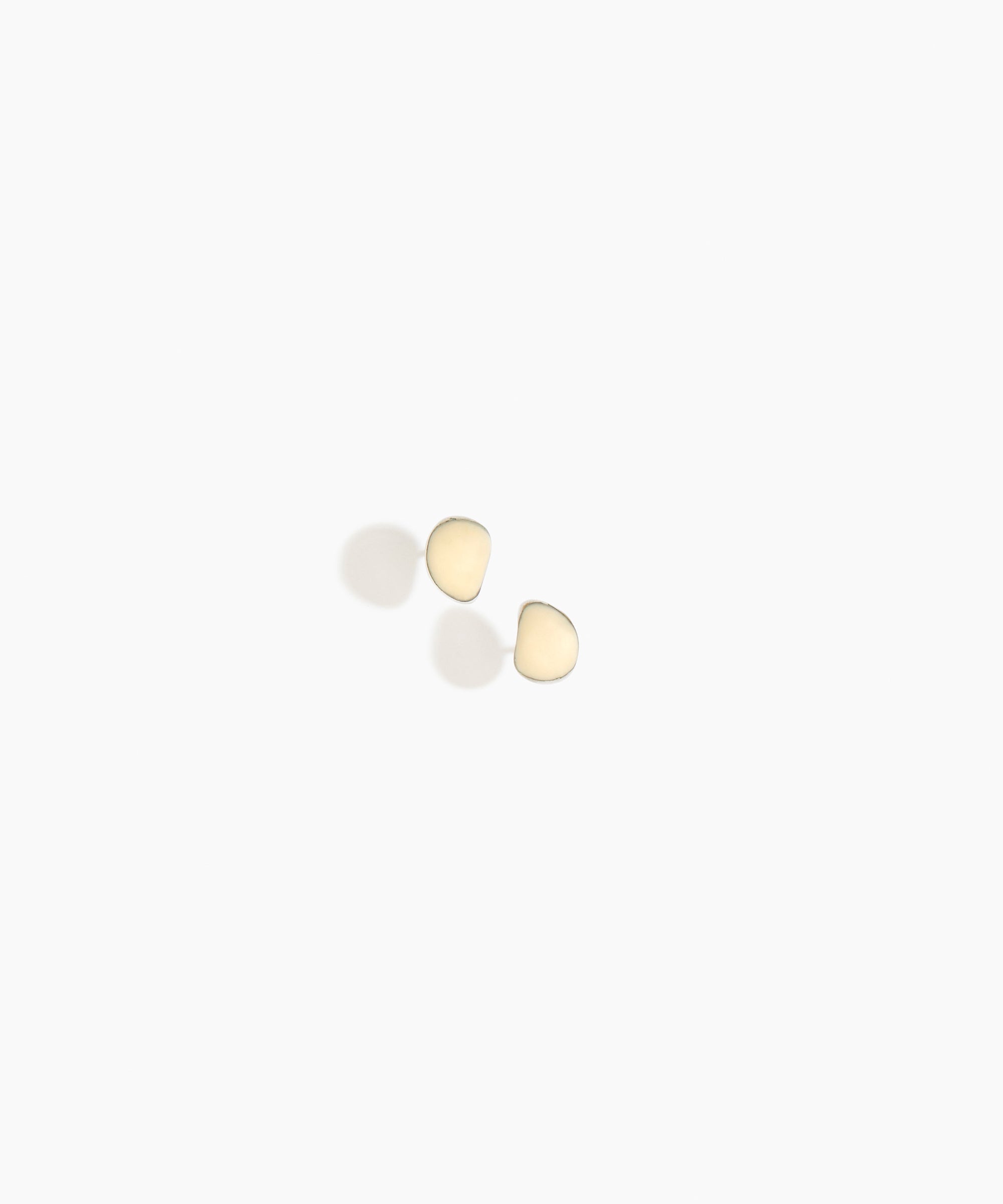 Dinosaur Designs Bones Stud Earrings in Cream Colour resin with Silver-Plated Brass Material..
