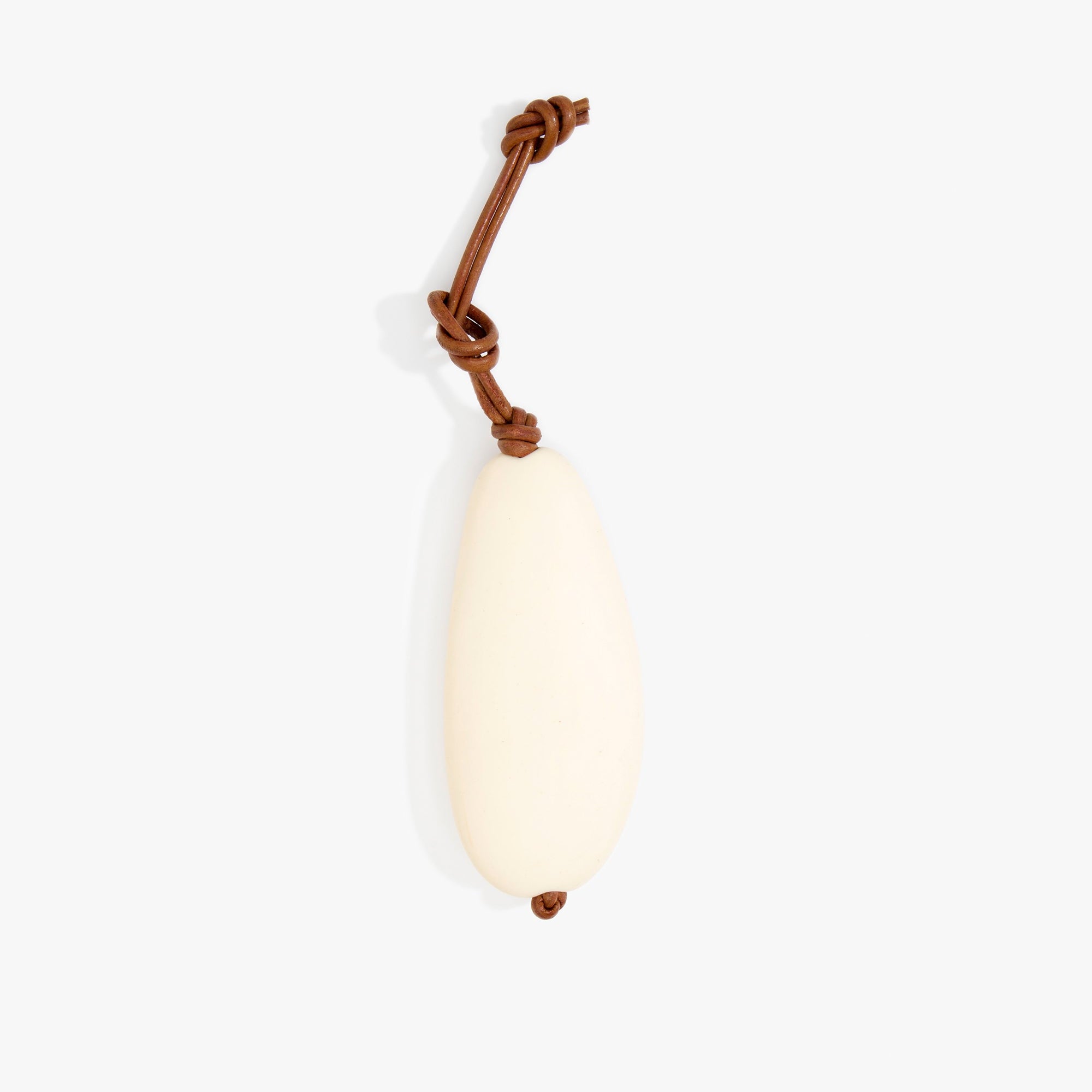 Dinosaur Designs KEYORGPEB pebble keyring CREAM .