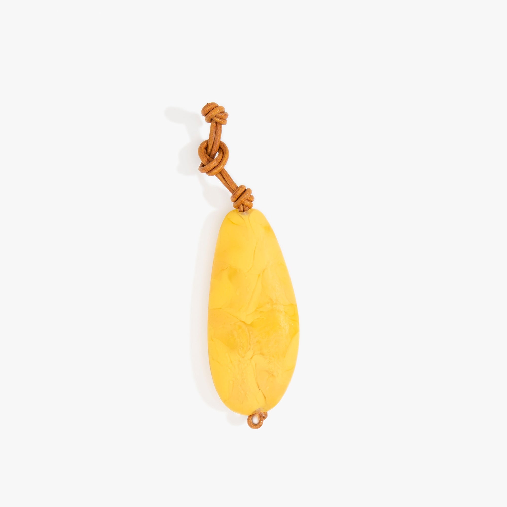 Dinosaur Designs Pebble Keyring in Honeycomb Colour resin.