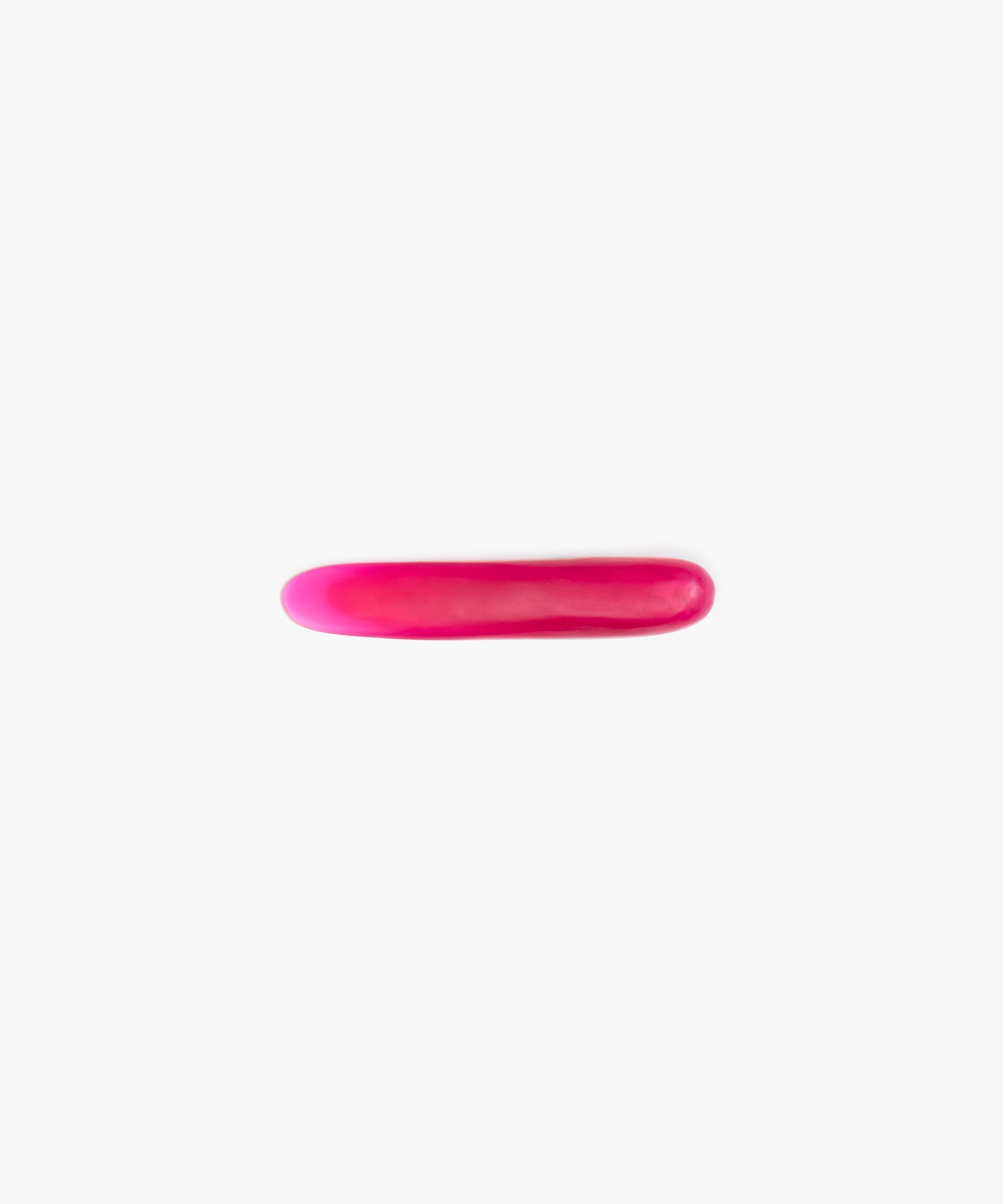 Dinosaur Designs Stone Butter Knife in Flamingo Colour resin.