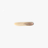 Dinosaur Designs Stone Butter Knife in Sandy Pearl Colour resin..