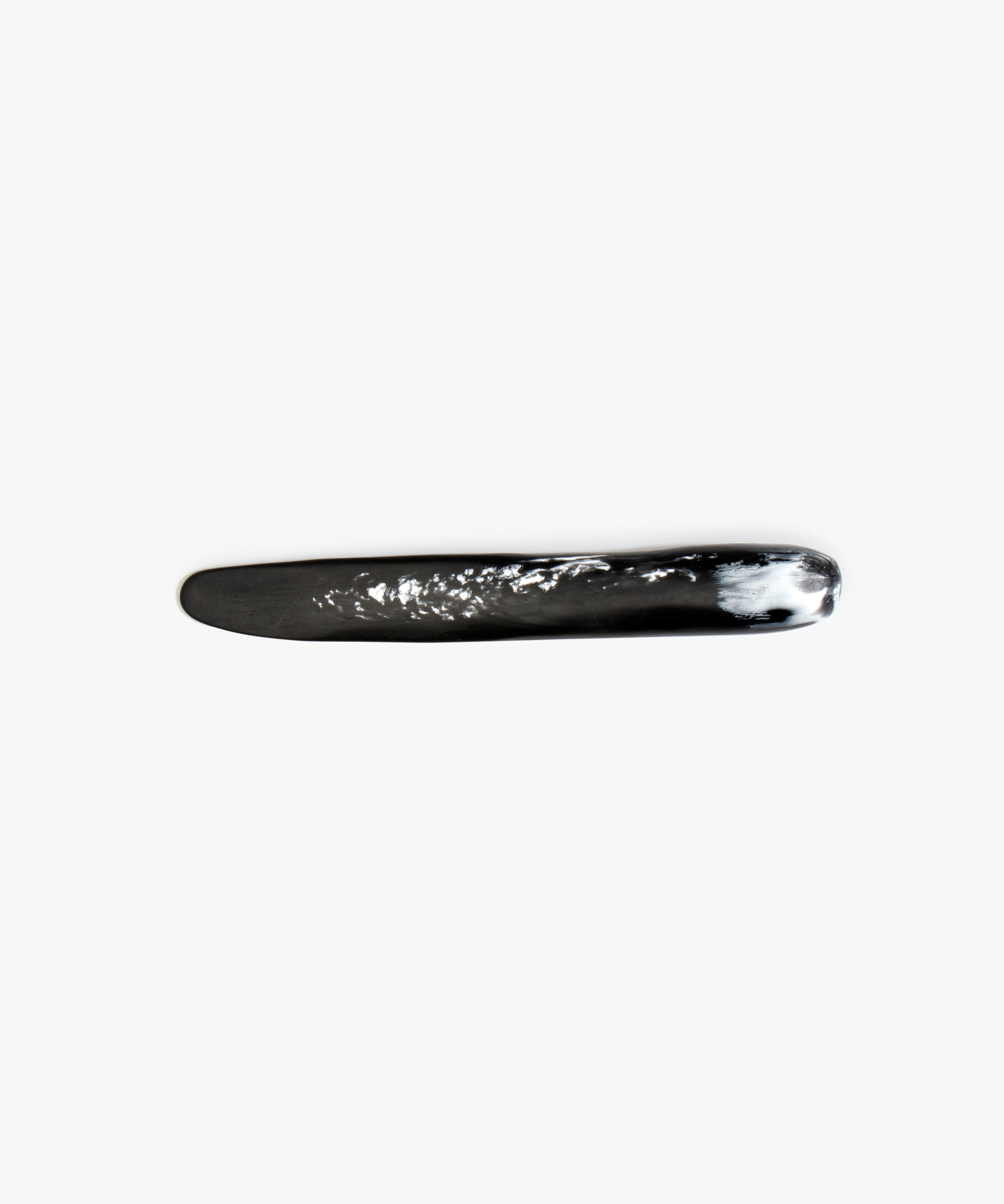 Dinosaur Designs Stone Cheese Knife in Black Marble Colour resin.