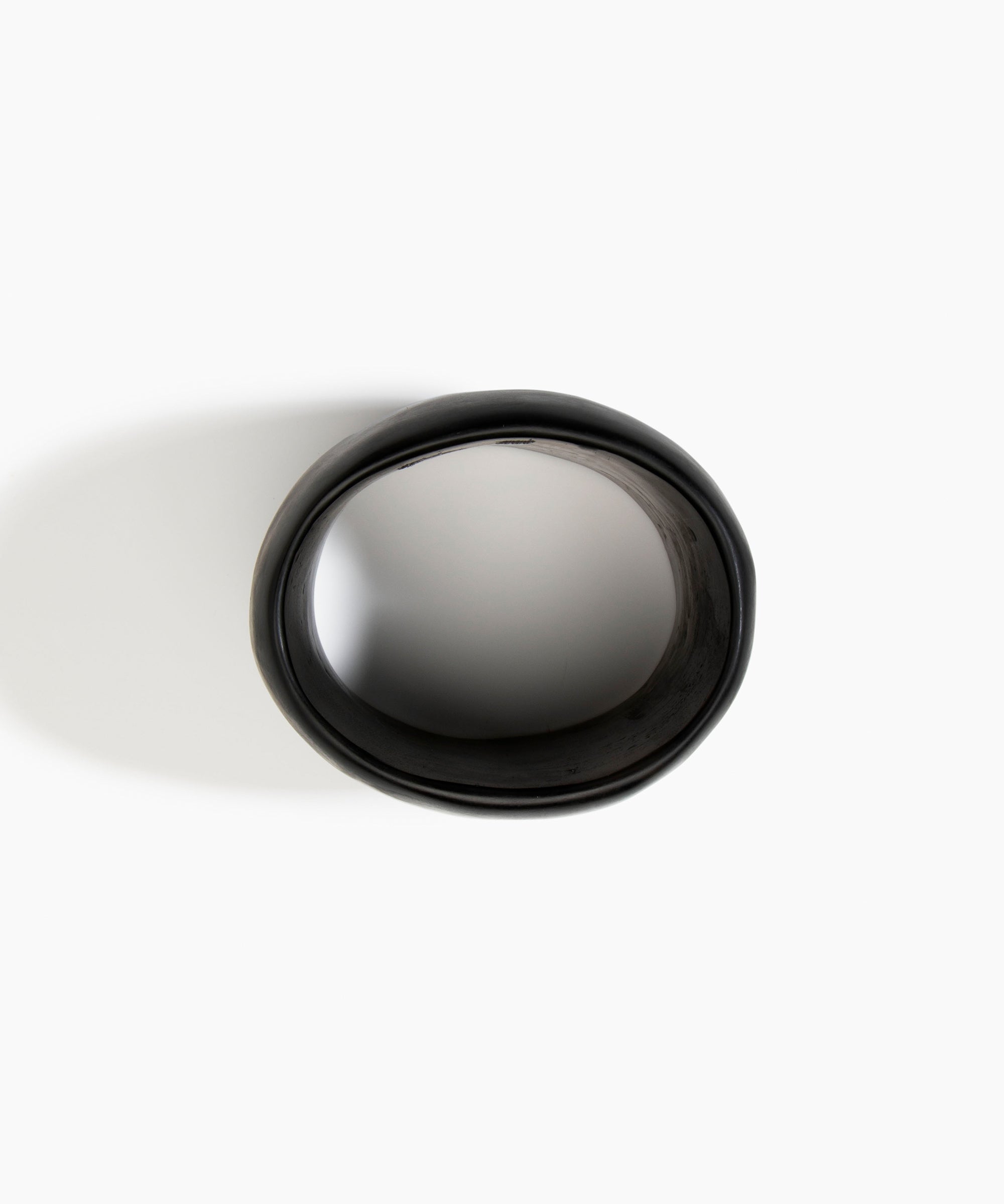 Dinosaur Designs Small Bones Bowl in Cream — small handmade cream resin shallow serving bowl with a rounded organic form.