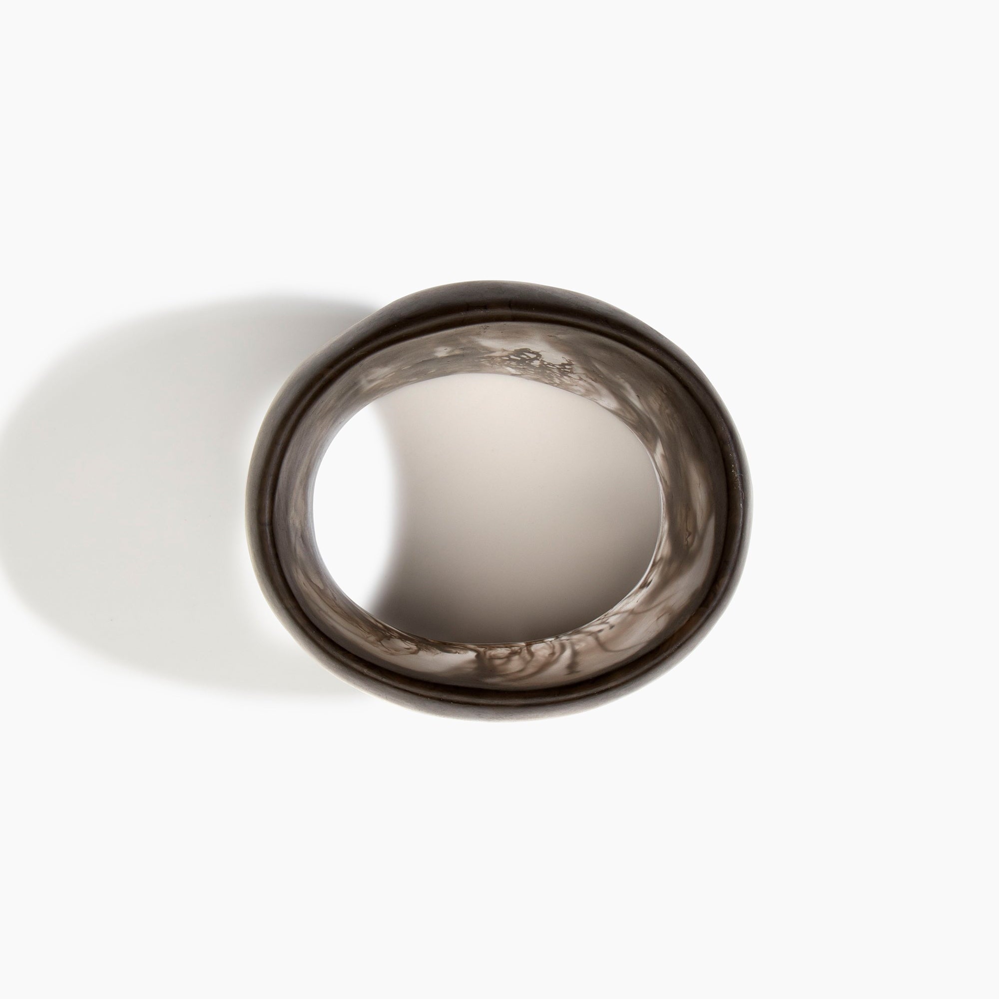 Dinosaur Designs Large Pebble Hoop Earrings in Silver-Plated Brass — polished silver-plated brass oversized oval hoop earrings with tapered wire and stud fastening..