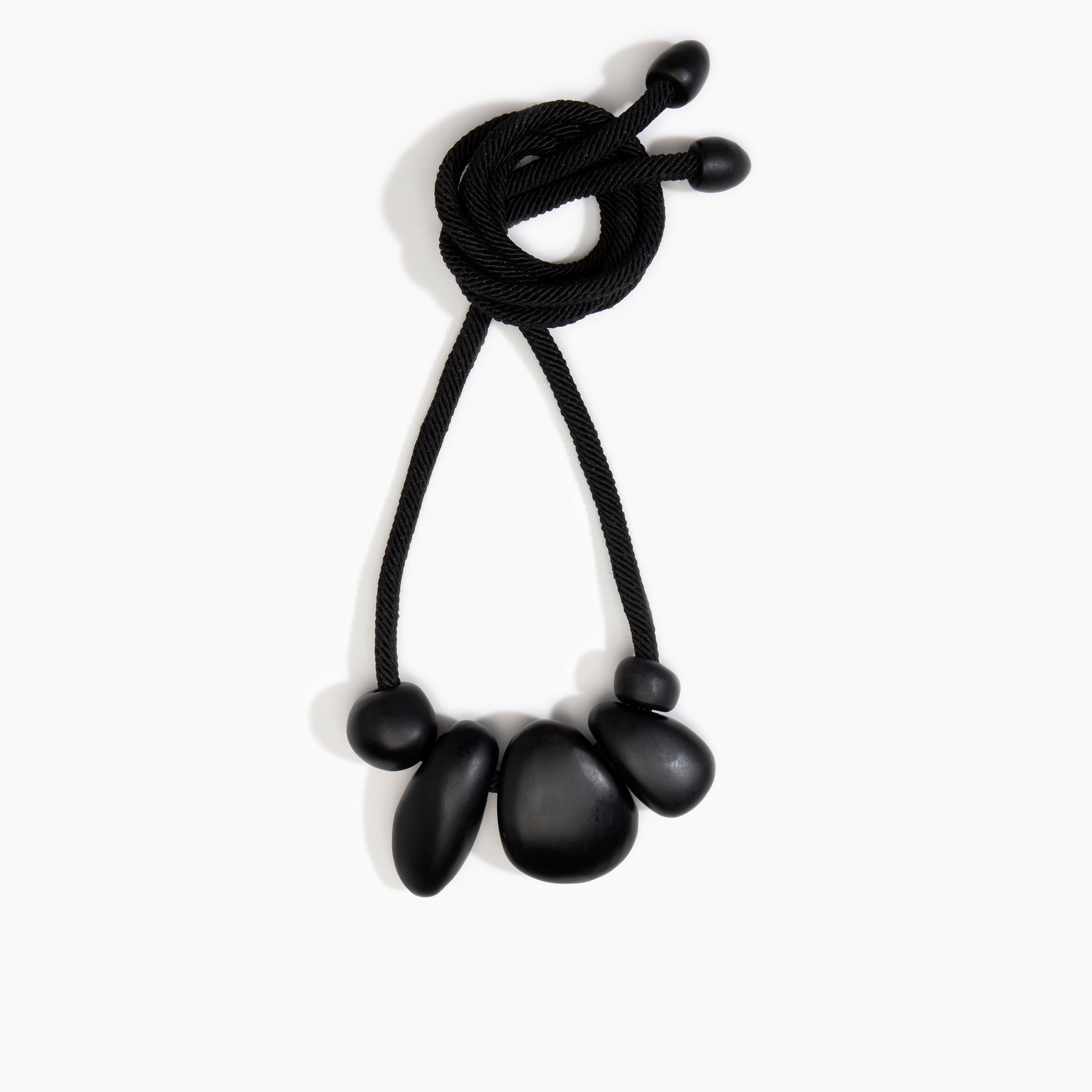 Dinosaur Designs Boulder Rock Necklace in Black Colour resin.