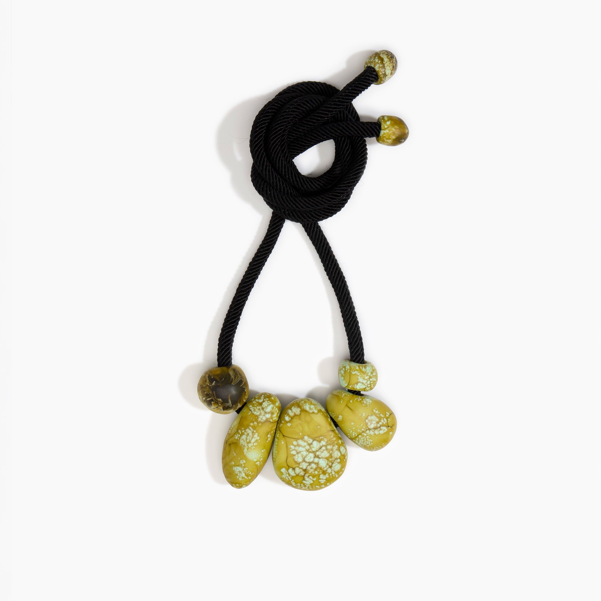 Dinosaur Designs Boulder Rock Necklace in Malachite Colour resin.