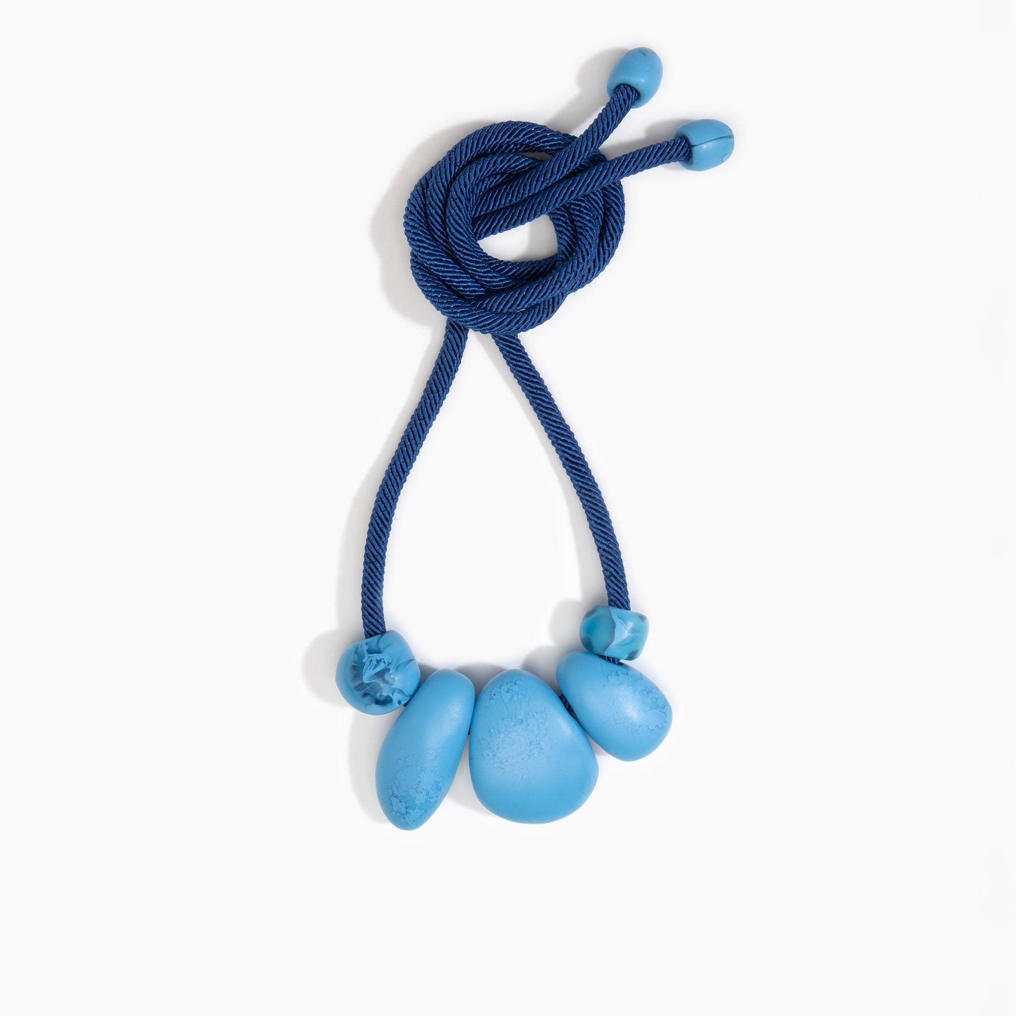 Dinosaur Designs Boulder Rock Necklace in Sky Colour resin.