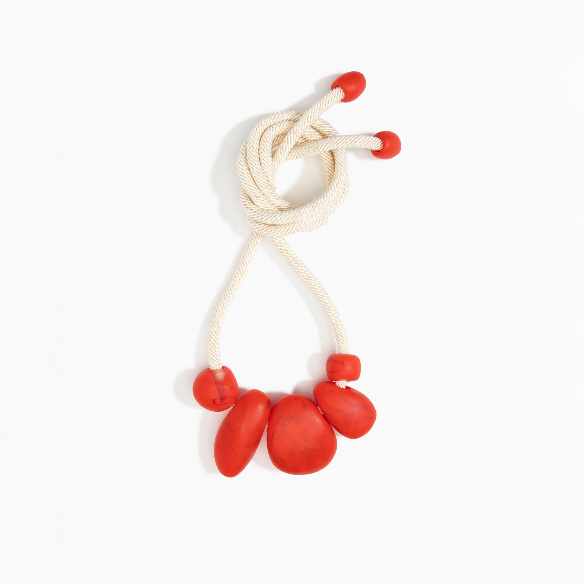 Dinosaur Designs Boulder Rock Necklace in Poppy Colour resin.