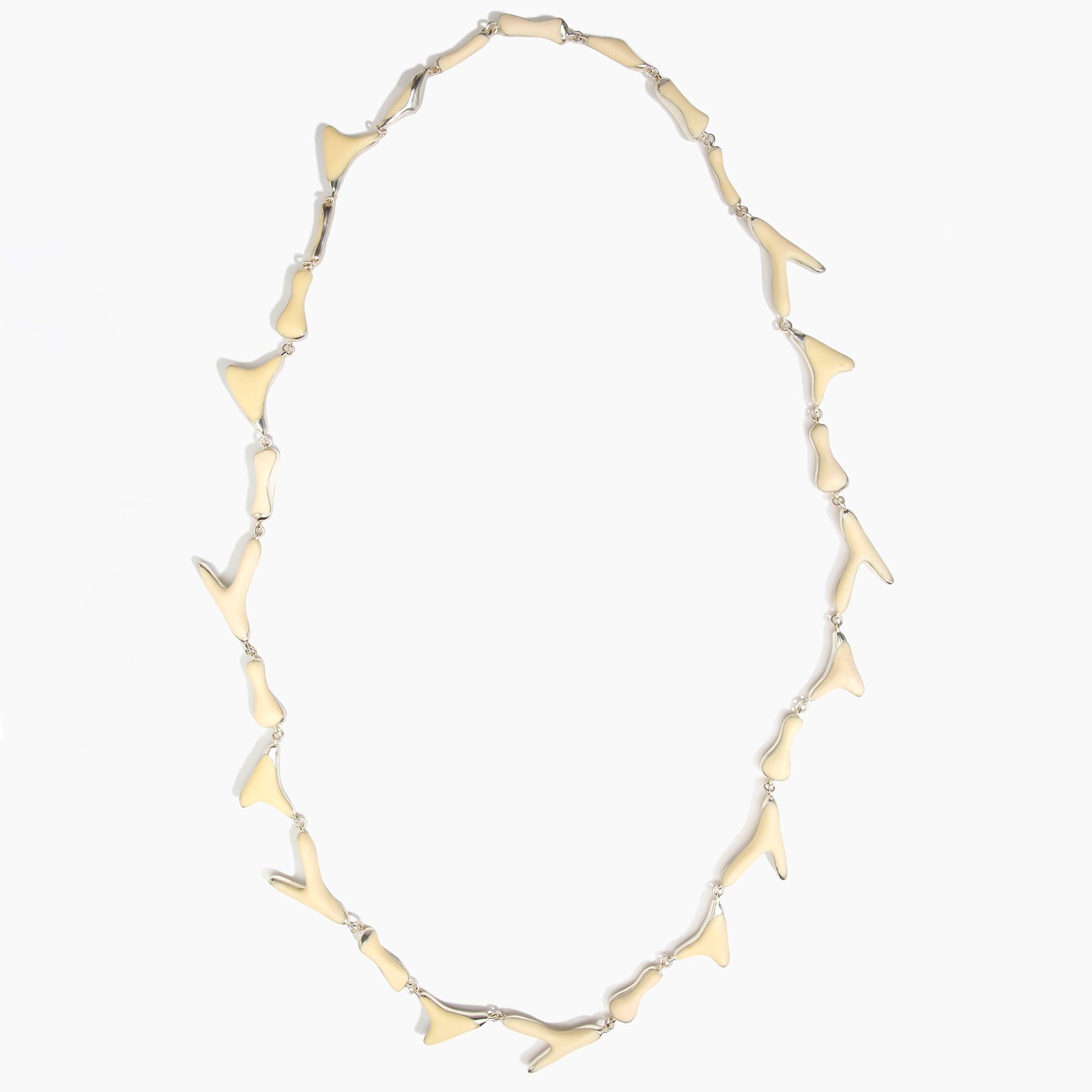 Dinosaur Designs Long Bones Necklace in Cream Colour resin with Silver-Plated Brass Material.