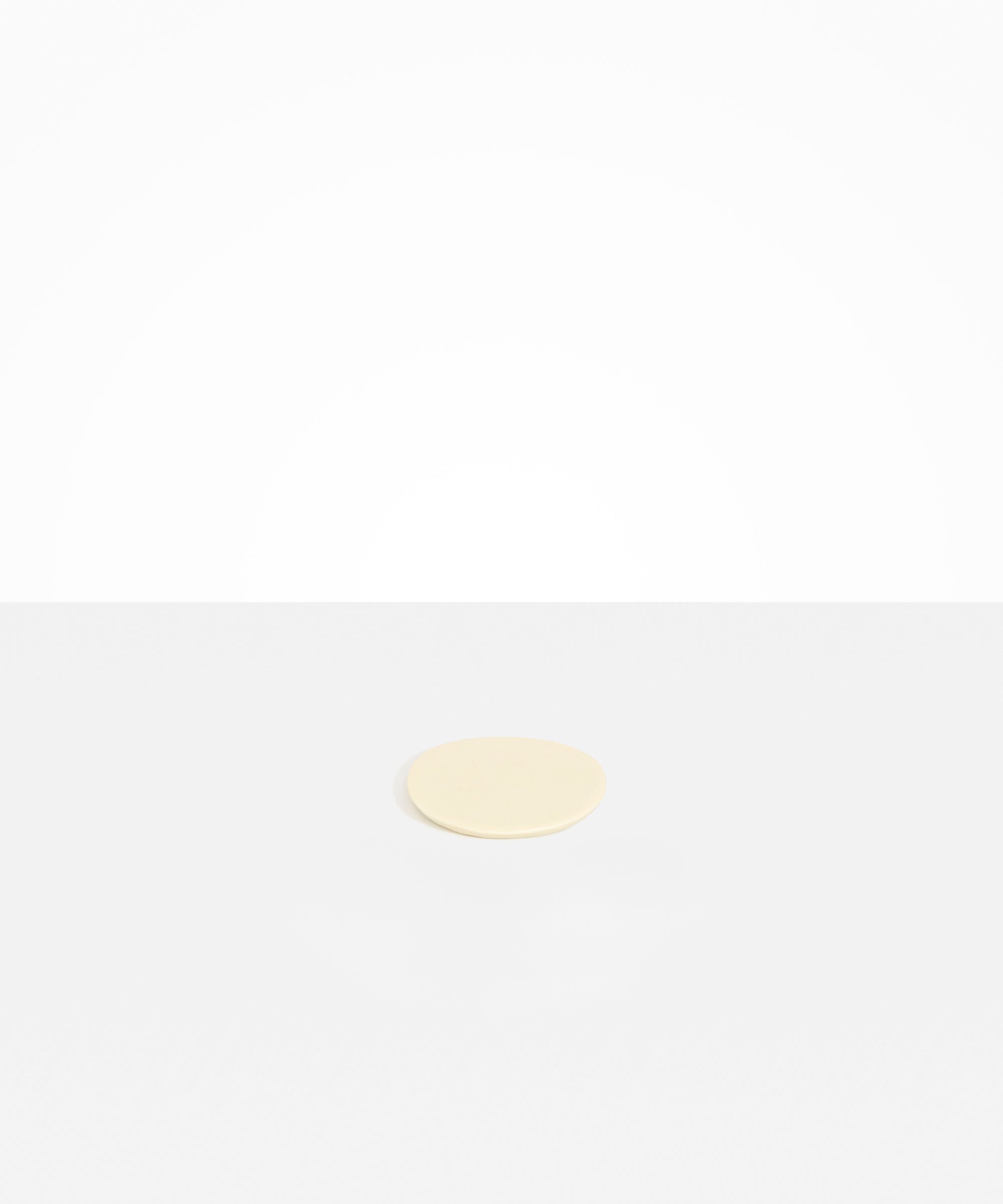 Dinosaur Designs Boulder Coaster in Cream Colour resin.