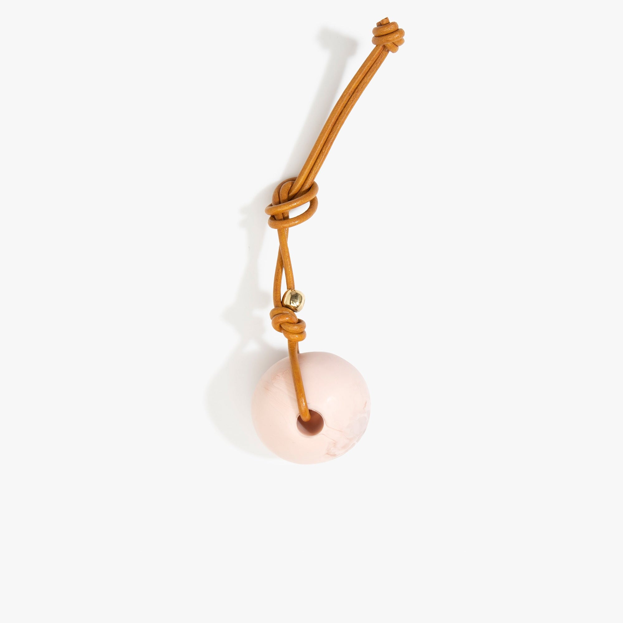 Dinosaur Designs Round Watercolour Bag Charm in Rose Swirl Colour resin with Brass Material..