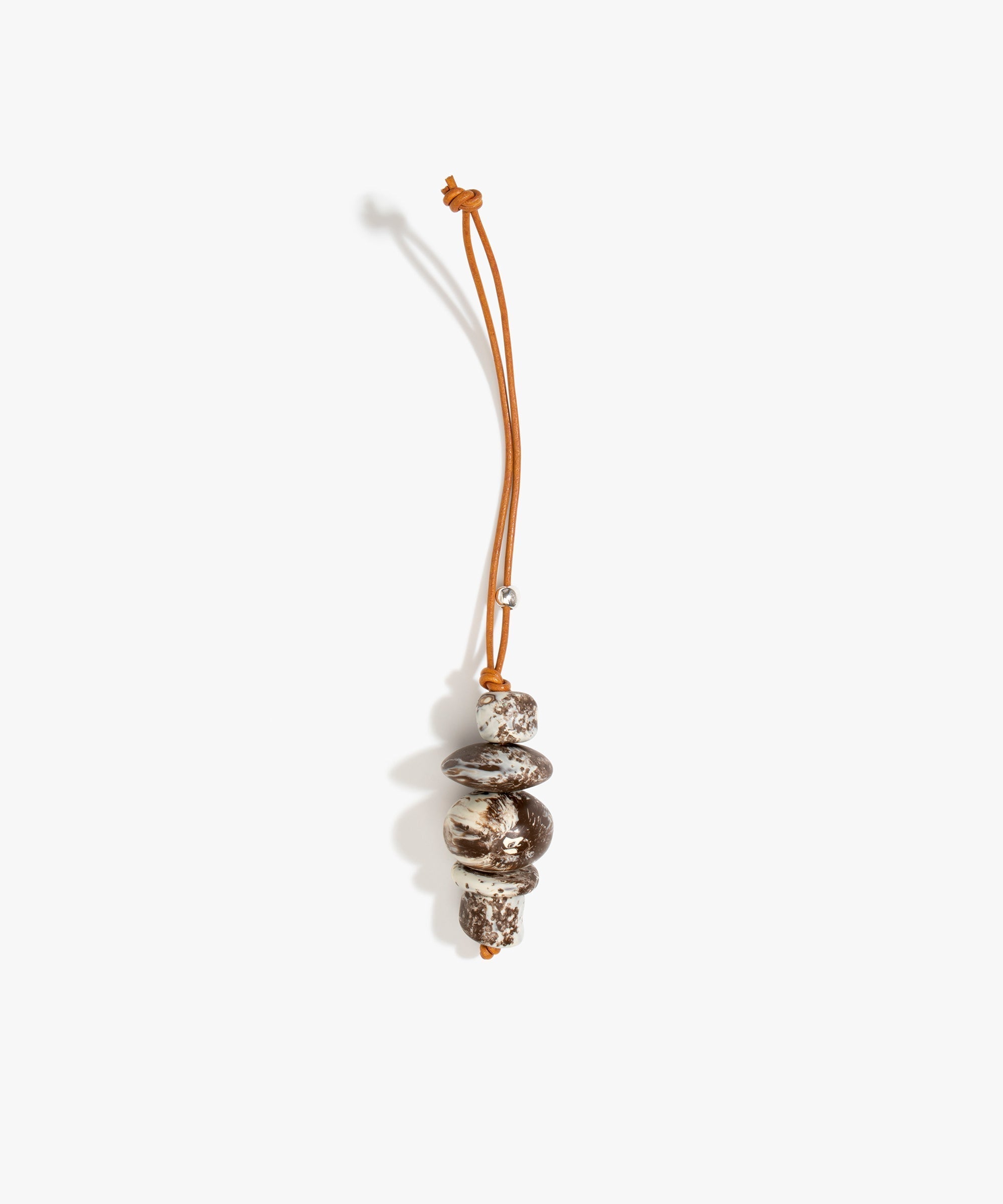 Dinosaur Designs Splash Decoration in Cappuccino Colour resin with 925 Sterling Silver Material.