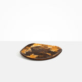 Dinosaur Designs Pebble Plate in Dark Horn Colour resin
