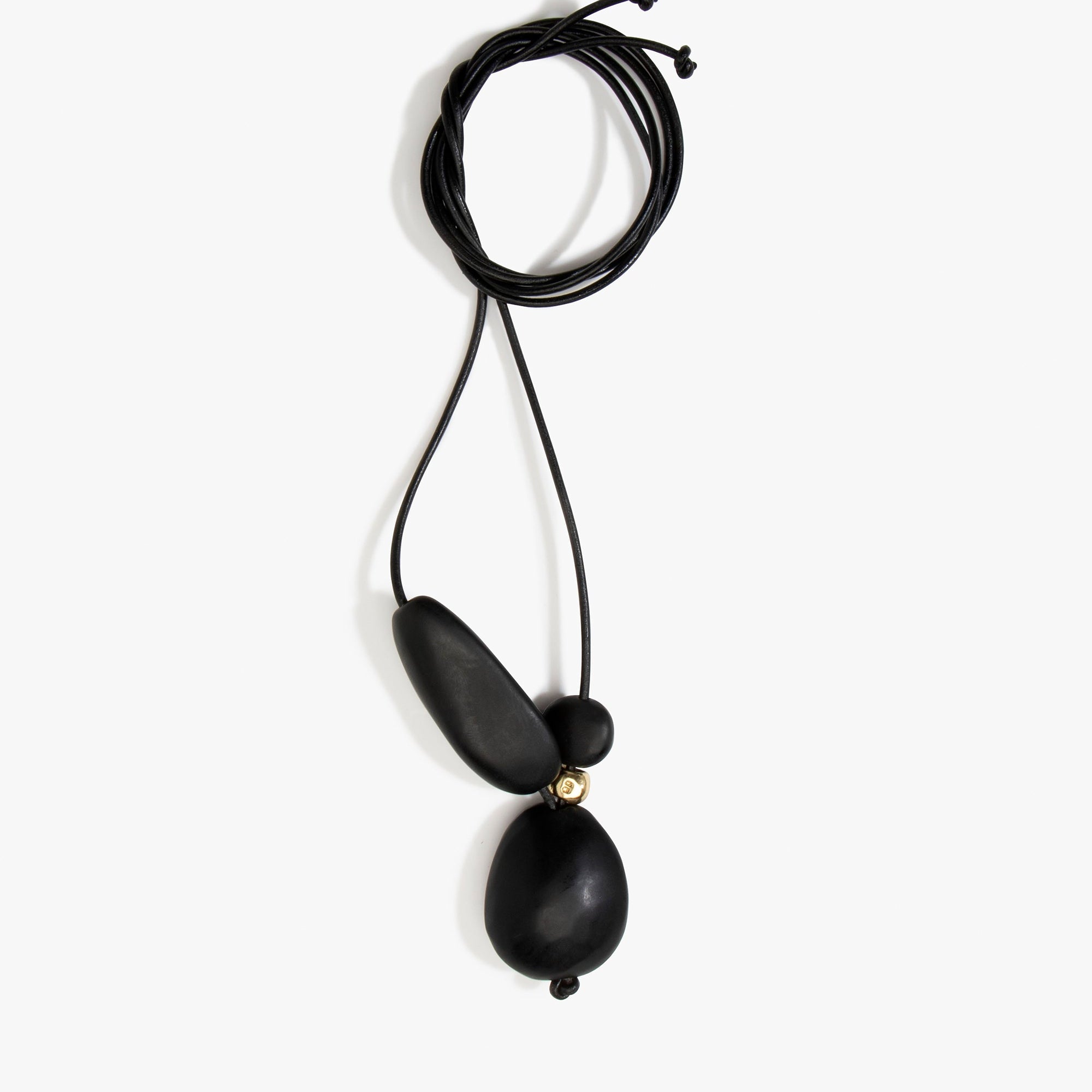 Dinosaur Designs Rock Cluster Pendant in Black Colour resin with Nano-Coated Brass Bead Material.