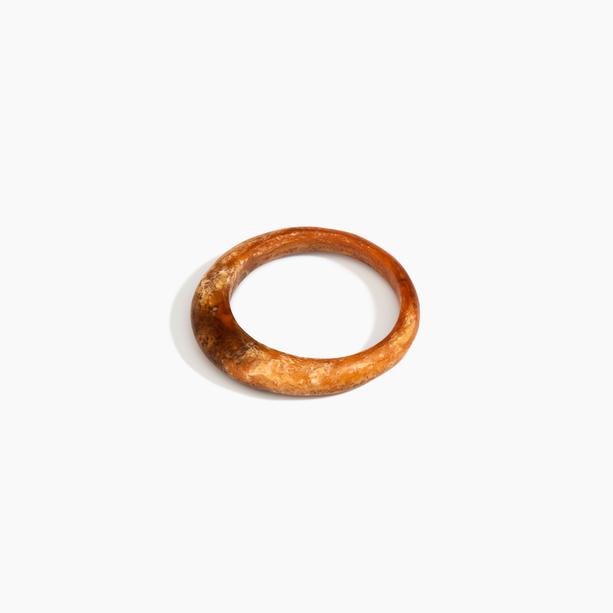 Dinosaur Designs Small Organic Bangle in Dark Horn Colour resin with Regular Fit.