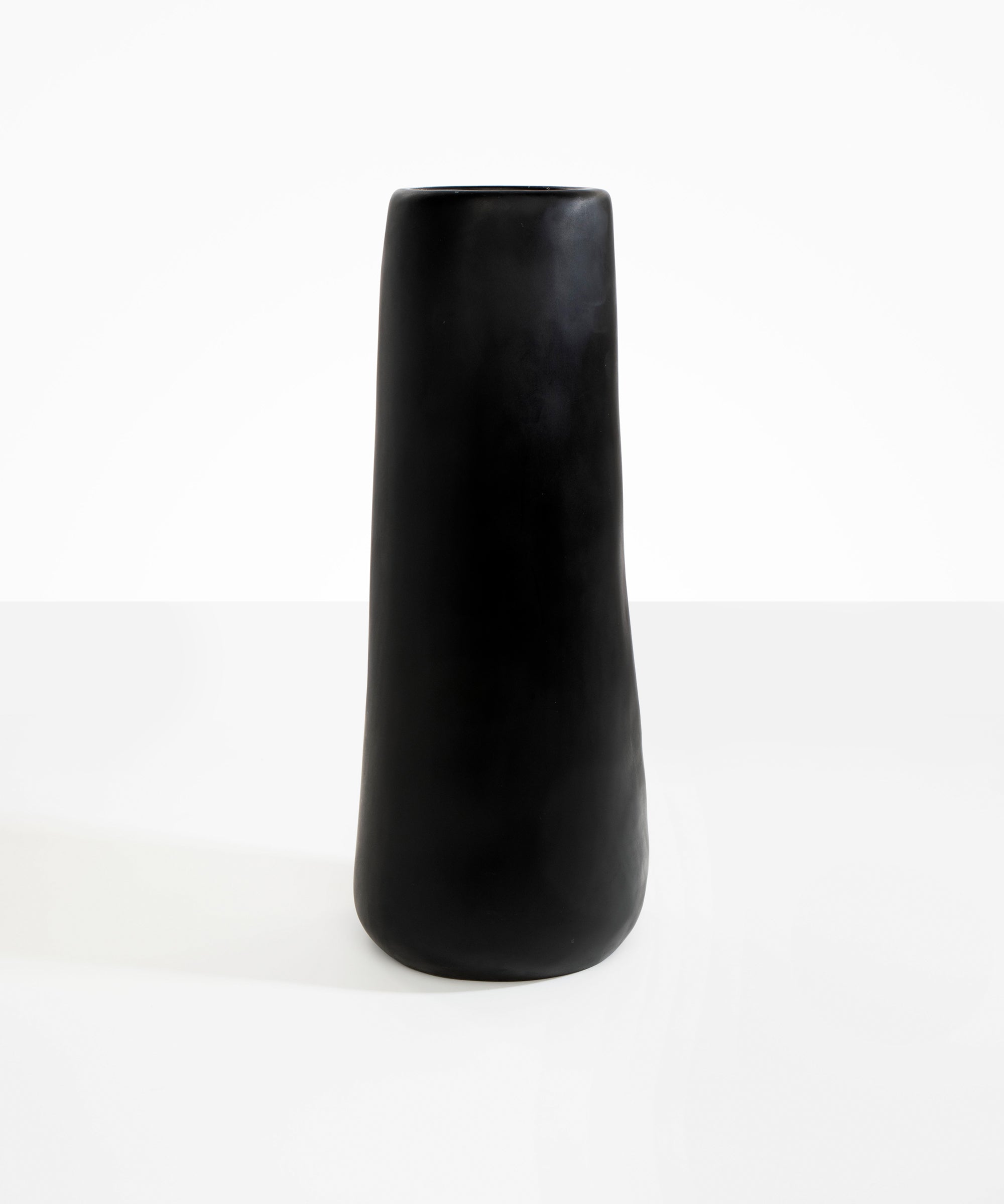 Dinosaur Designs Tall Pebble Vase in Black Colour resin..